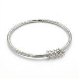 Coastal Tide Textured Silver Bangle with Floating Rings