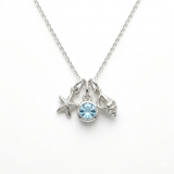 Ocean Breeze Charm Necklace - Blue Topaz